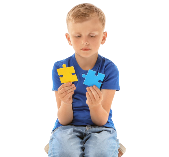 kid holding puzzles