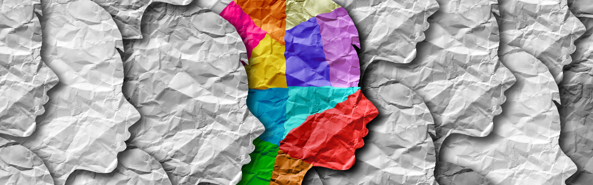 illustration of colorful person with group of grayed persons behind